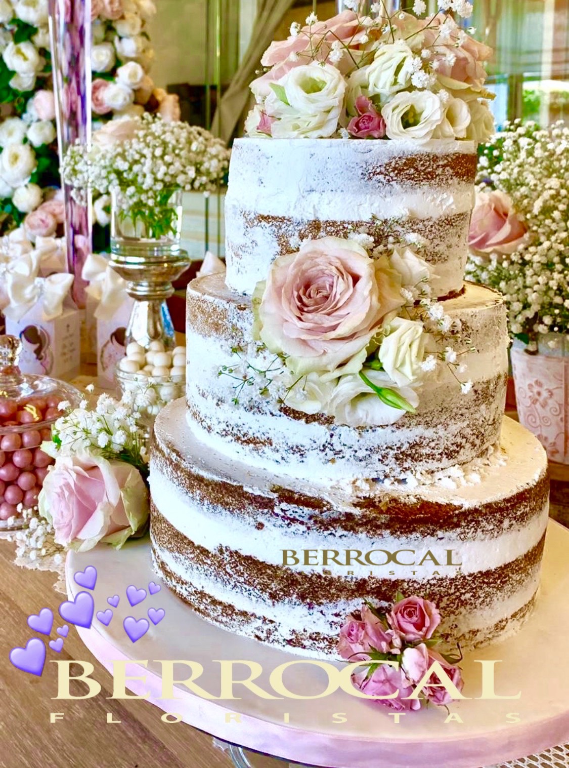 Cake decorated with white flowers. Roses and Lisianthus.