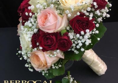 Bridal bouquet with roses. And Boutonniere.